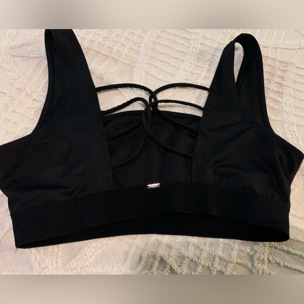 Victoria’s Secret black strappy sports bra.